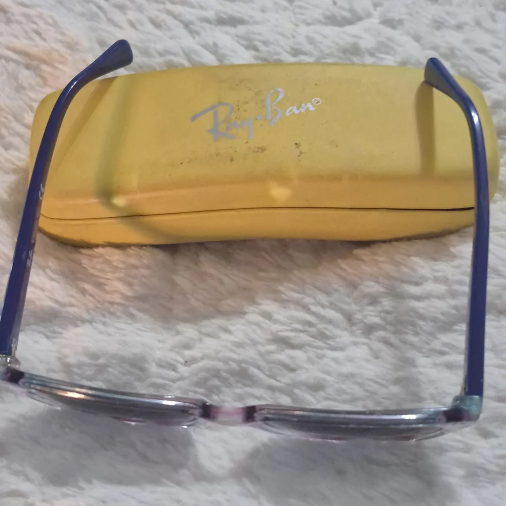 Ray-Ban Transparent Blue Sunglasses with Vibrant Case